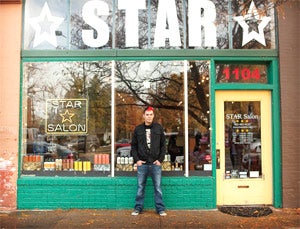 Getting his cut: Hair stylist Duane Schneider uses pay anywhere to process payments.