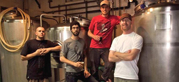 McKean Banzer-Lausberg (on far right) credits hosting community events helps Migration Brewing stand out.