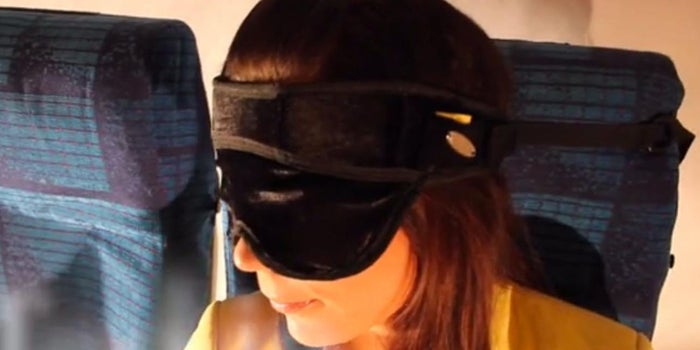 This Crazy Contraption Straps Your Head to an Airline Seat for Better Sleep