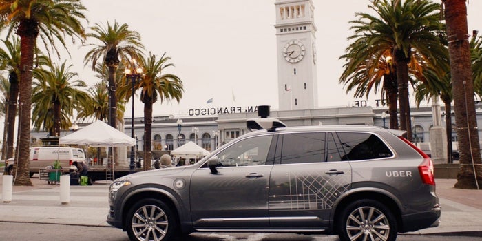 Human Driving Autonomous Uber Car Caught Running Red Light
