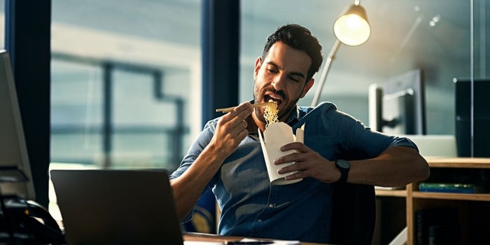 Ask the Etiquette Expert: How to Eat at Your Desk Without Offending Others