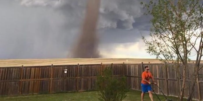 The Canadian Man Mowing His Lawn Amid a Tornado Is a Role Model for Us All
