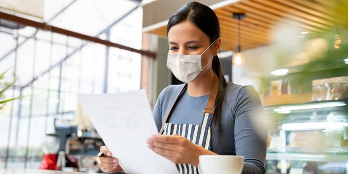 Woman working at a cafe