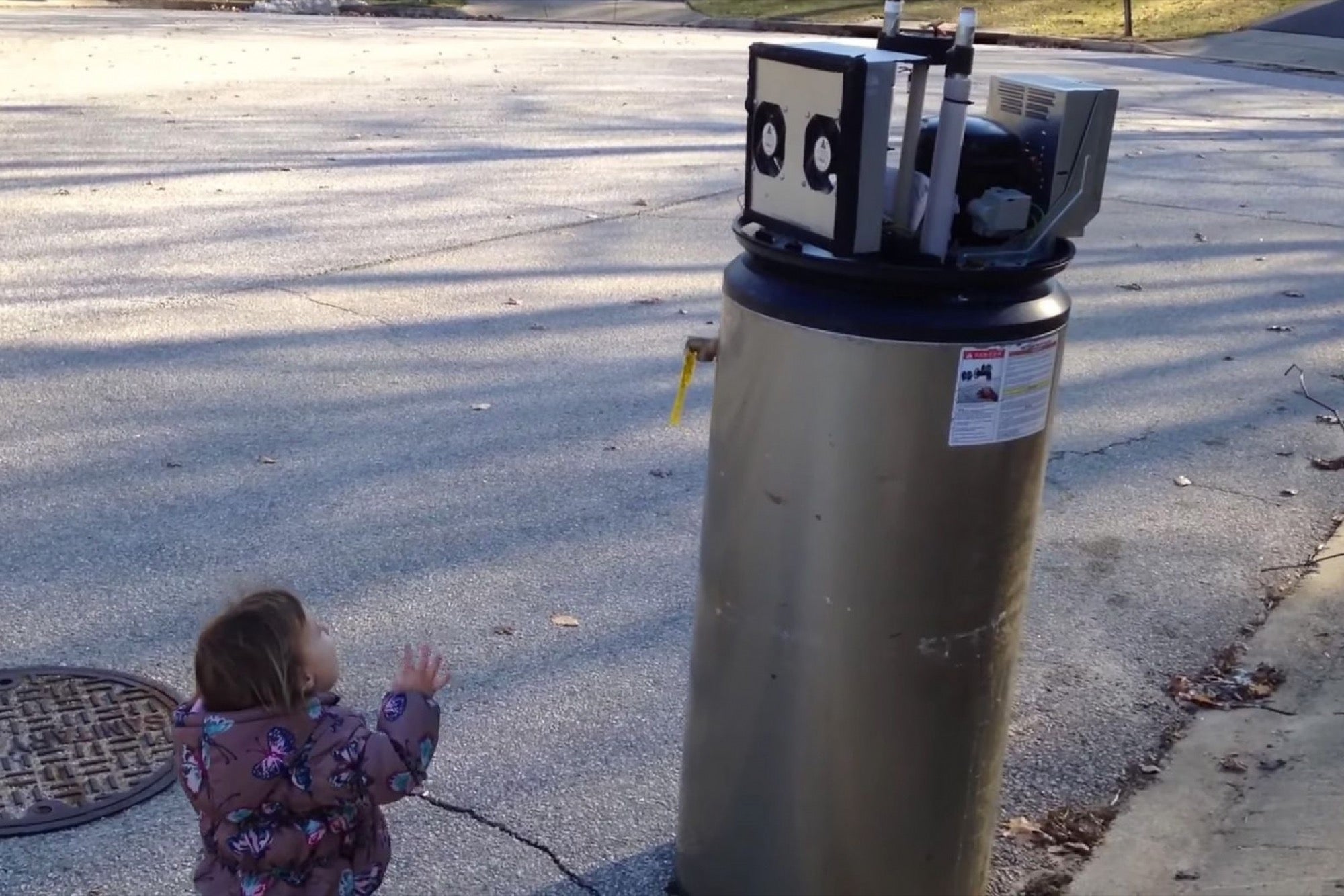 Watch This Adorably Cute Toddler Mistake a Water Heater for a Robot