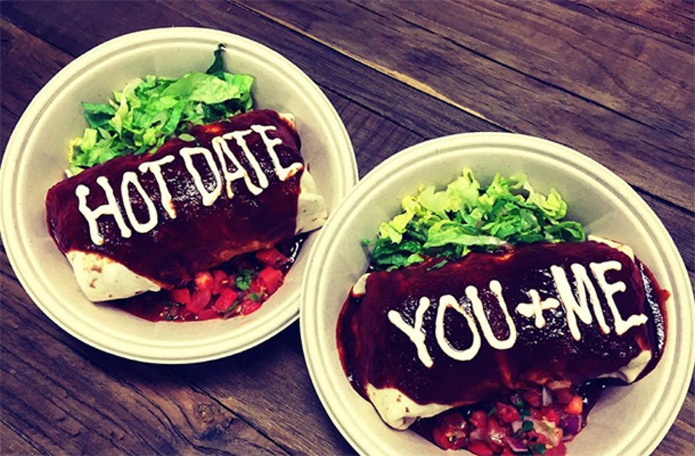 Embrace PDA at Qdoba for a free burrito.