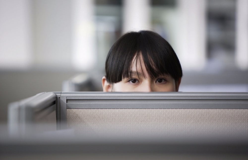 10. Sitting in a cubicle
