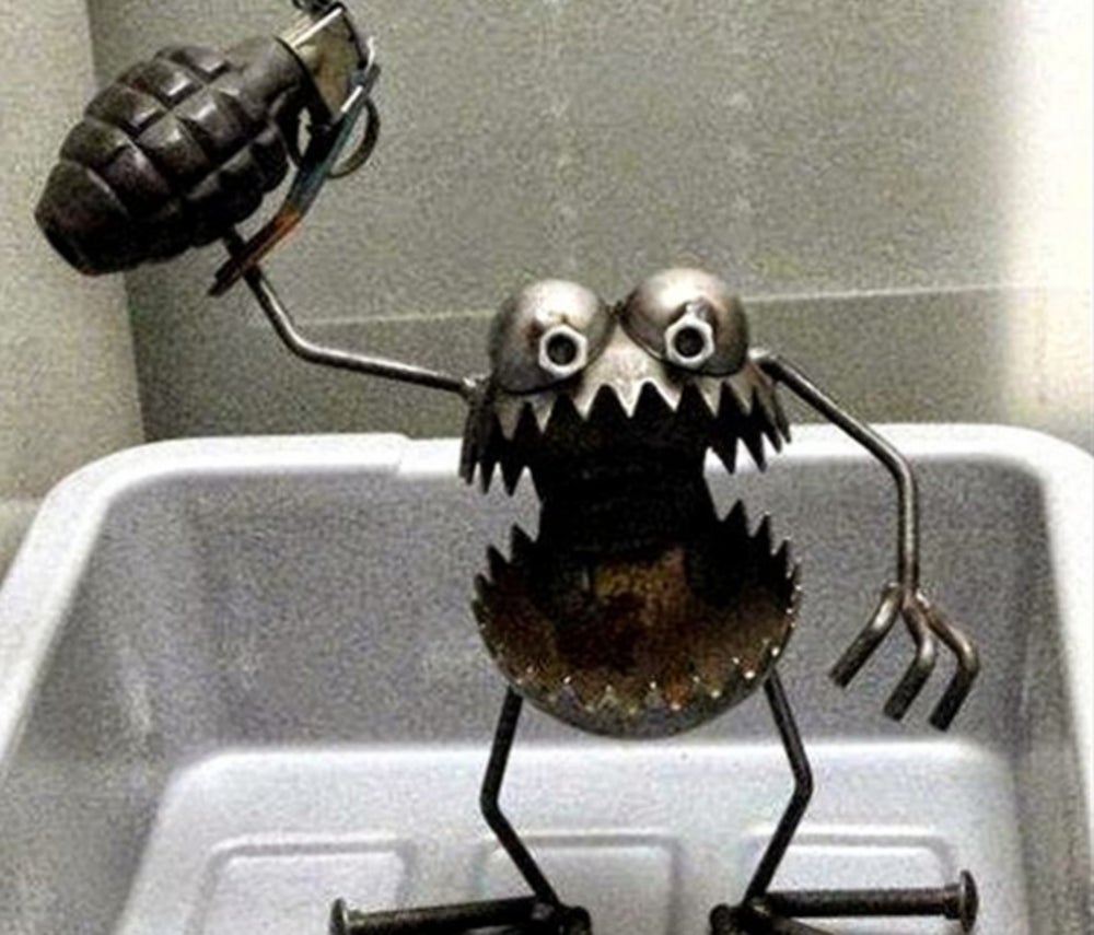 3. Sculpture monster with a grenade