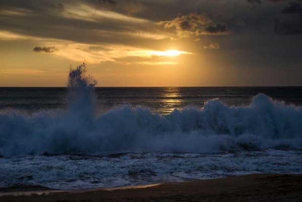 Listen to sounds of waves crashing.