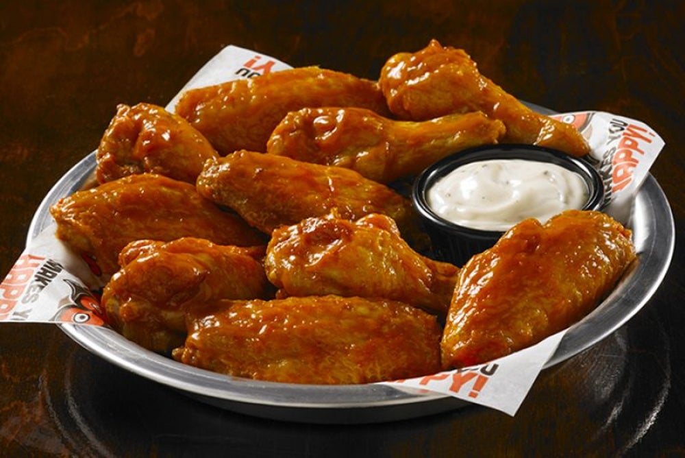 Eat some free wings at Hooters -- if you’re single.
