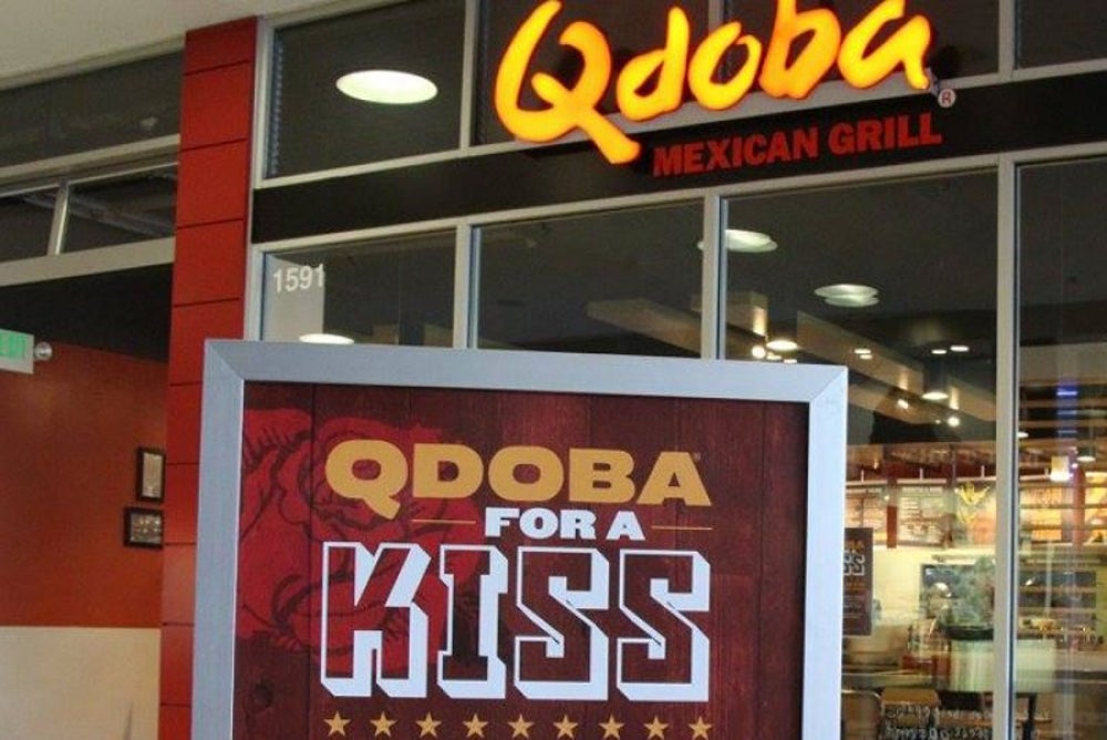 Share a kiss at Qdoba for a free second meal.