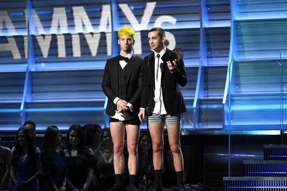 Pop band Twenty One Pilots accepts its first Grammy award in their boxer briefs.