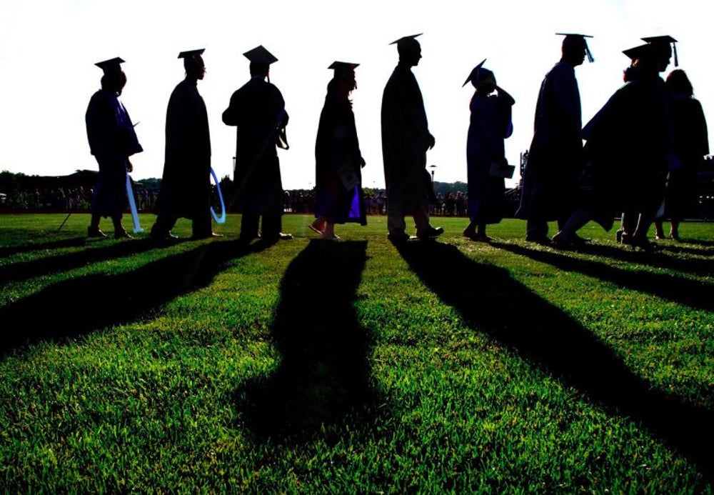 Student misses his graduation because of a train delay, so subway passengers create one for him.