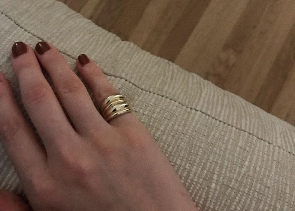 Hannah wearing her own polish and rings