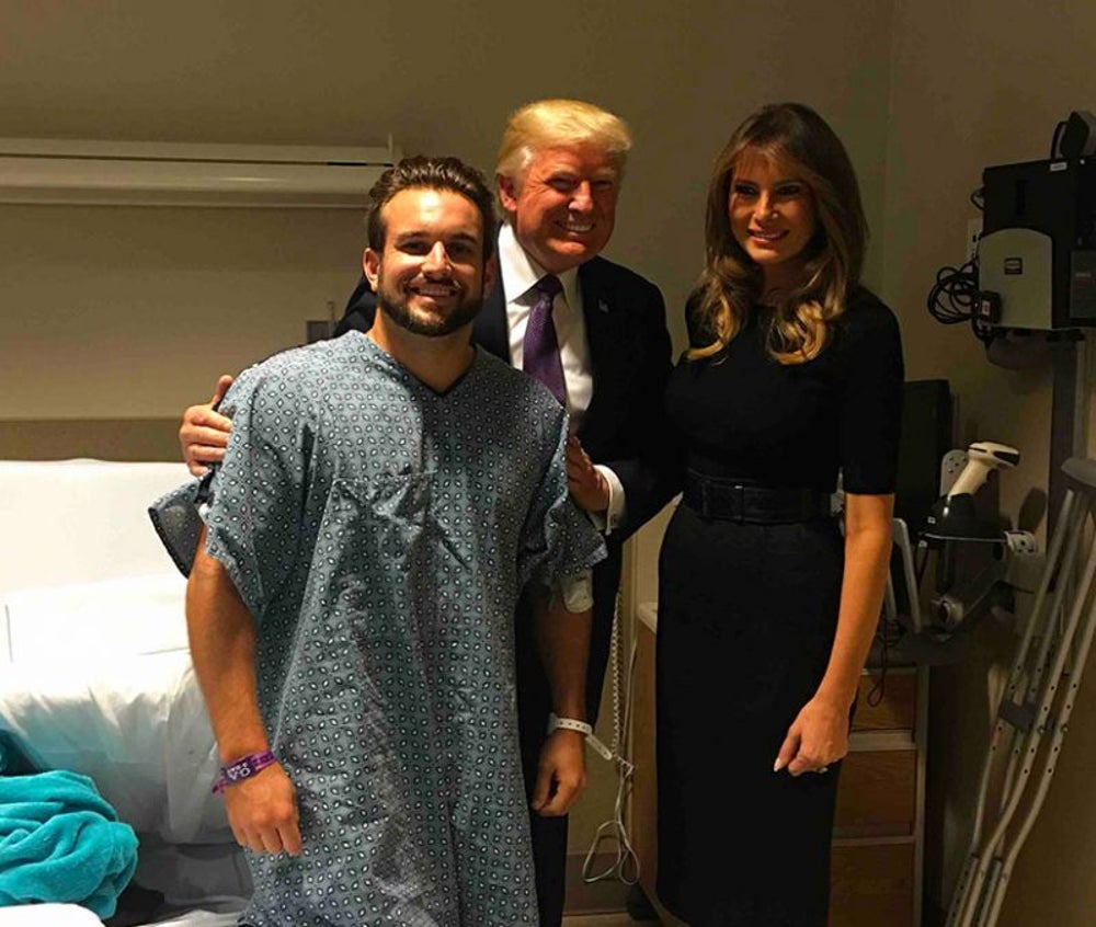 A victim of the Las Vegas shooting fights through his injuries to stand for the president.