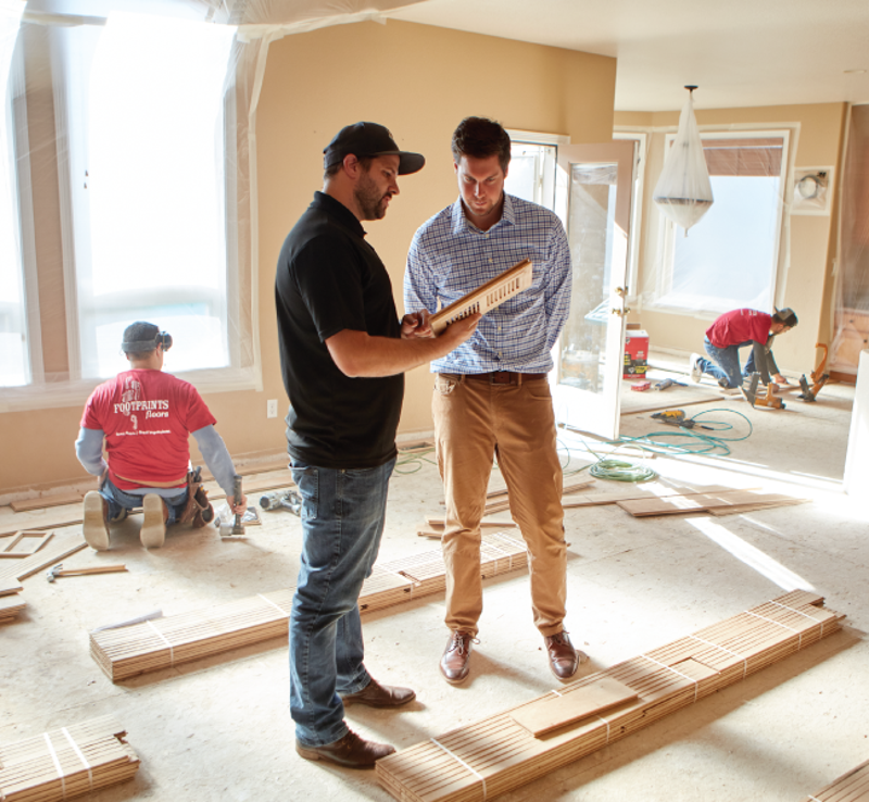 men installing floors